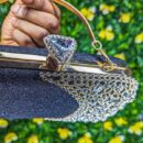 Sac / pochette de soirée noir pailleté avec strass dorés
